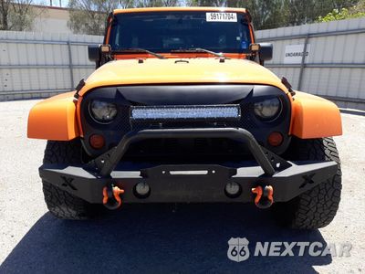 Piąte zdjęcie samochodu w środku: 2012 JEEP WRANGLER UNLIMITED SAHARA VIN:1C4BJWEG8CL236557 - miniatura