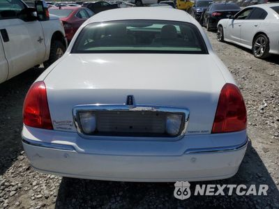 Zdjęcie 6 z 14 samochodu: 2004 LINCOLN TOWN CAR EXECUTIVE VIN:1LNHM81W14Y637023 - miniatura