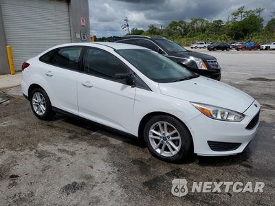 Czwarte zdjęcie samochodu z boku: 2018 FORD FOCUS SE VIN:1FADP3F21JL202004 - miniatura