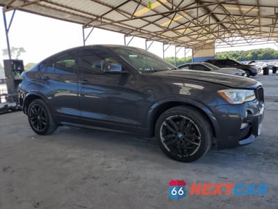 Czwarte zdjęcie samochodu z boku: 2015 BMW X4 XDRIVE28I VIN:5UXXW3C58F0M87493 - miniatura