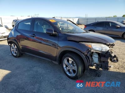 Czwarte zdjęcie samochodu z boku: 2016 HONDA HR-V LX VIN:3CZRU5H3XGM756265 - miniatura
