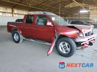 Czwarte zdjęcie samochodu z boku: 2000 NISSAN FRONTIER CREW CAB XE VIN:1N6ED27T8YC429576 - miniatura