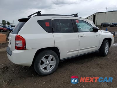 Trzecie zdjęcie samochodu z tyłu: 2010 JEEP COMPASS SPORT VIN:1J4NF4FB7AD547484 - miniatura