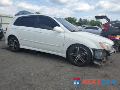 Czwarte zdjęcie samochodu z boku: 2005 KIA SPECTRA5 VIN:KNAFE161155077310 - miniatura