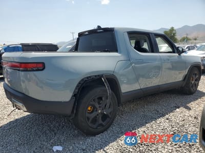 Trzecie zdjęcie samochodu z tyłu: 2022 RIVIAN R1T ADVENTURE VIN:7FCTGAAA8NN011533 - miniatura