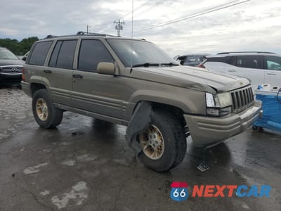 Czwarte zdjęcie samochodu z boku: 1996 JEEP GRAND CHEROKEE LIMITED VIN:1J4FX78S6TC281030 - miniatura