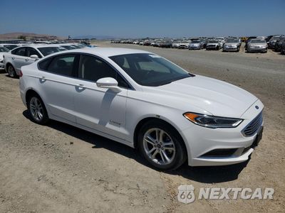 Czwarte zdjęcie samochodu z boku: 2018 FORD FUSION SE HYBRID VIN:3FA6P0LU0JR171553 - miniatura