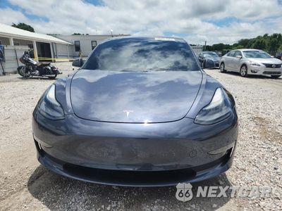 Piąte zdjęcie samochodu w środku: 2021 TESLA MODEL 3 VIN:5YJ3E1EB3MF903054 - miniatura