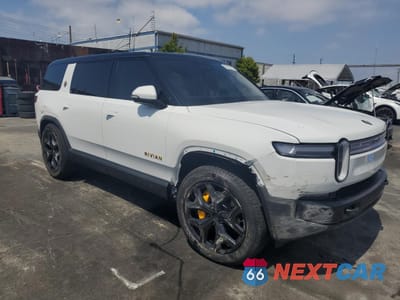 Czwarte zdjęcie samochodu z boku: 2025 RIVIAN R1S PREMIUM VIN:7PDSGCBP8SN064110 - miniatura