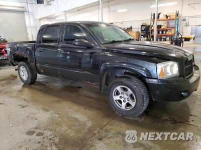 Czwarte zdjęcie samochodu z boku: 2007 DODGE DAKOTA QUAD SLT VIN:1D7HW48K17S128069 - miniatura
