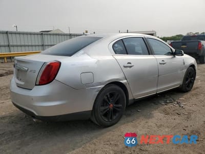 Trzecie zdjęcie samochodu z tyłu: 2011 LINCOLN MKS VIN:1LNHL9DR5BG612949 - miniatura