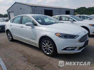 Czwarte zdjęcie samochodu z boku: 2017 FORD FUSION SE HYBRID VIN:3FA6P0LU8HR409675 - miniatura