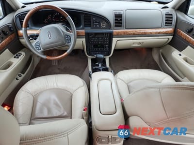 Zdjęcie 8 z 12 samochodu: 2000 LINCOLN CONTINENTAL VIN:1LNHM97V2YY764261 - miniatura