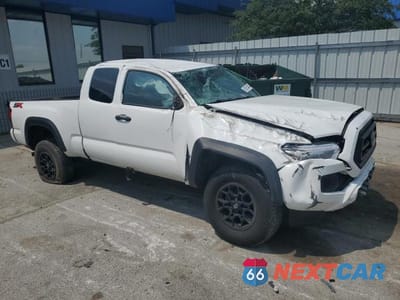 Czwarte zdjęcie samochodu z boku: 2022 TOYOTA TACOMA SR VIN:3TYRX5GN8NT066757 - miniatura