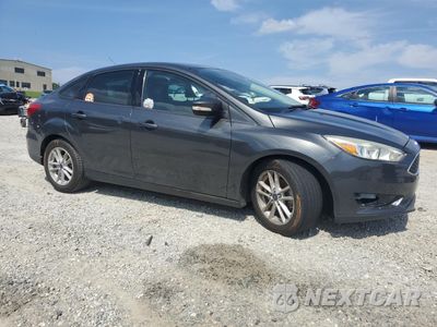 Czwarte zdjęcie samochodu z boku: 2017 FORD FOCUS SE VIN:1FADP3F21HL269471 - miniatura