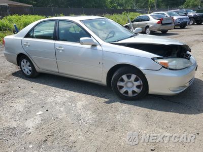 Czwarte zdjęcie samochodu z boku: 2002 TOYOTA CAMRY LE VIN:4T1BE32K42U570861 - miniatura