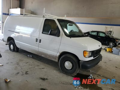 Czwarte zdjęcie samochodu z boku: 1998 FORD ECONOLINE E150 VAN VIN:1FTRE1428WHC17722 - miniatura