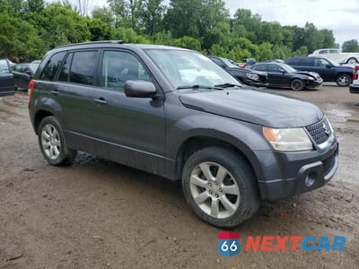 Czwarte zdjęcie samochodu z boku: 2012 SUZUKI GRAND VITARA JLX VIN:JS3TD0D77C4100636 - miniatura