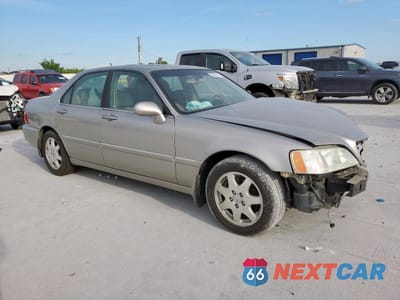 Czwarte zdjęcie samochodu z boku: 2002 ACURA 3.5RL VIN:JH4KA966X2C008807 - miniatura