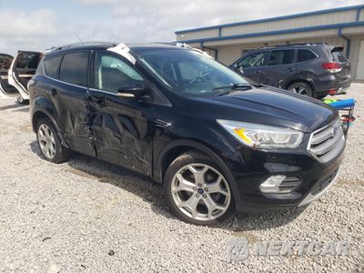 Czwarte zdjęcie samochodu z boku: 2017 FORD ESCAPE TITANIUM VIN:1FMCU0JD0HUC08995 - miniatura