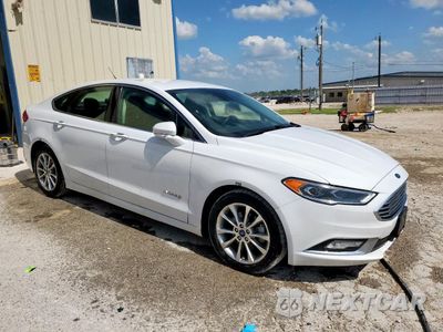 Czwarte zdjęcie samochodu z boku: 2017 FORD FUSION SE HYBRID VIN:3FA6P0LU9HR359675 - miniatura