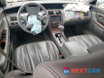Zdjęcie 8 z 13 samochodu: 2000 TOYOTA AVALON XL VIN:4T1BF28B7YU020089 - miniatura