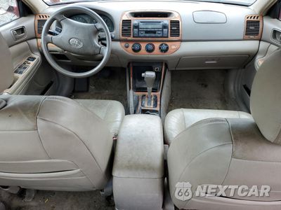Zdjęcie 8 z 12 samochodu: 2002 TOYOTA CAMRY LE VIN:4T1BE32K42U552957 - miniatura