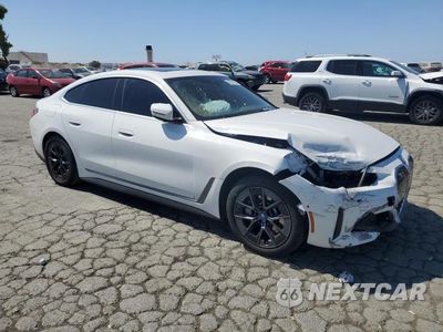 Czwarte zdjęcie samochodu z boku: 2024 BMW I4 EDRIVE 35 VIN:WBY43AW03RFS68684 - miniatura
