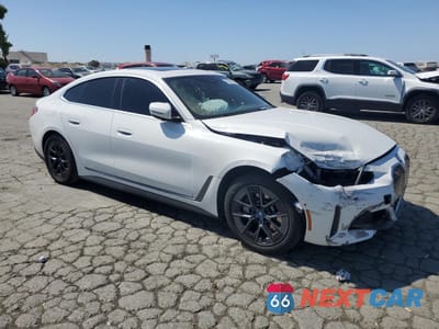 Czwarte zdjęcie samochodu z boku: 2024 BMW I4 EDRIVE 35 VIN:WBY43AW03RFS68684 - miniatura