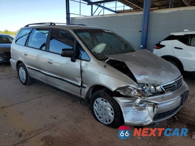 Czwarte zdjęcie samochodu z boku: 1998 HONDA ODYSSEY LX VIN:JHMRA3847WC003593 - miniatura