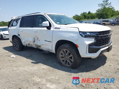 Czwarte zdjęcie samochodu z boku: 2024 CHEVROLET SUBURBAN K1500 Z71 VIN:1GNSKDKD3RR169858 - miniatura