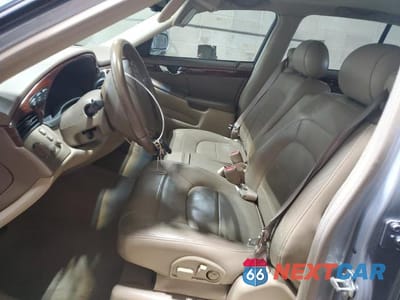 Zdjęcie 7 z 12 samochodu: 2004 CADILLAC DEVILLE VIN:1G6KD54Y84U236455 - miniatura
