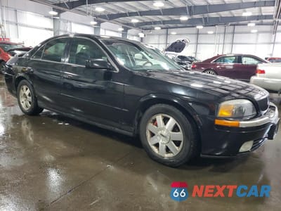 Czwarte zdjęcie samochodu z boku: 2002 LINCOLN LS VIN:1LNHM87A72Y702790 - miniatura