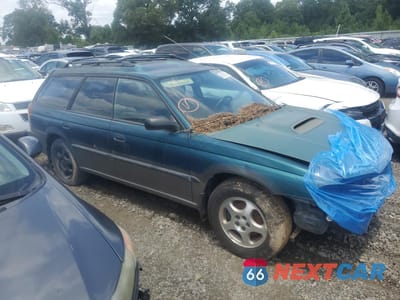 Czwarte zdjęcie samochodu z boku: 1997 SUBARU LEGACY OUTBACK VIN:4S3BG6853V7644940 - miniatura