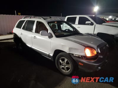 Czwarte zdjęcie samochodu z boku: 2004 HYUNDAI SANTA FE GLS VIN:KM8SC13E84U713106 - miniatura