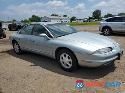 Czwarte zdjęcie samochodu z boku: 1997 OLDSMOBILE AURORA VIN:1G3GR62C0V4108195 - miniatura