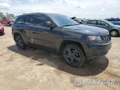 Czwarte zdjęcie samochodu z boku: 2014 JEEP GRAND CHEROKEE LAREDO VIN:1C4RJFAG6EC518381 - miniatura