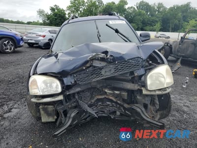 Piąte zdjęcie samochodu w środku: 2004 HYUNDAI SANTA FE GLS VIN:KM8SC13E94U799011 - miniatura