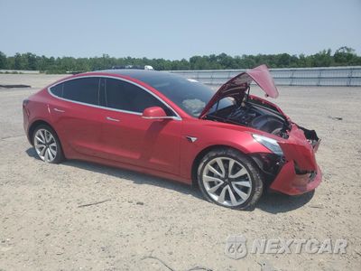 Czwarte zdjęcie samochodu z boku: 2018 TESLA MODEL 3 VIN:5YJ3E1EB2JF135224 - miniatura
