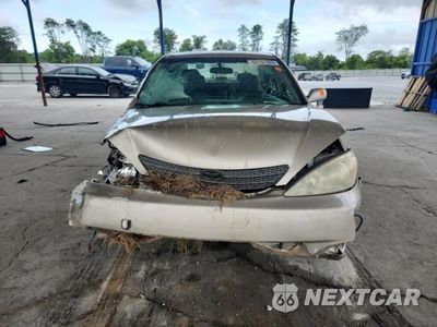 Piąte zdjęcie samochodu w środku: 2003 TOYOTA CAMRY LE VIN:JTDBE32K630181359 - miniatura