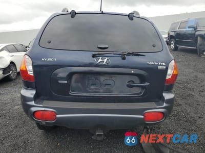 Zdjęcie 6 z 13 samochodu: 2004 HYUNDAI SANTA FE GLS VIN:KM8SC13E94U799011 - miniatura