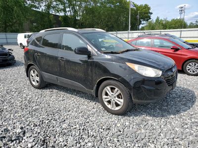 Czwarte zdjęcie samochodu z boku: 2011 HYUNDAI TUCSON GLS VIN:KM8JUCAC6BU143254 - miniatura