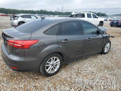 Trzecie zdjęcie samochodu z tyłu: 2016 FORD FOCUS SE VIN:1FADP3F26GL337892 - miniatura