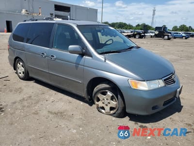 Czwarte zdjęcie samochodu z boku: 2001 HONDA ODYSSEY EX VIN:2HKRL18651H569136 - miniatura