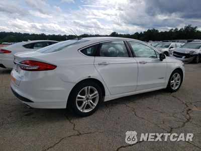 Trzecie zdjęcie samochodu z tyłu: 2018 FORD FUSION SE HYBRID VIN:3FA6P0LU0JR278747 - miniatura