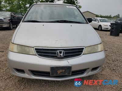 Piąte zdjęcie samochodu w środku: 2002 HONDA ODYSSEY LX VIN:2HKRL18502H546808 - miniatura