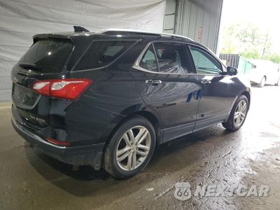 Trzecie zdjęcie samochodu z tyłu: 2018 CHEVROLET EQUINOX PREMIER VIN:2GNAXVEV6J6141947 - miniatura