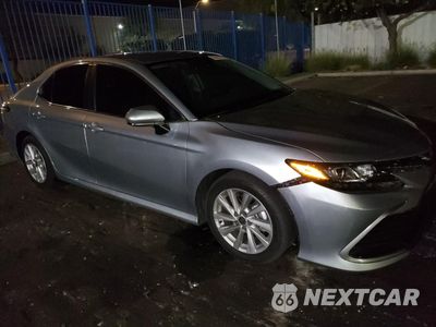 Czwarte zdjęcie samochodu z boku: 2024 TOYOTA CAMRY LE VIN:4T1C11AK6RU895284 - miniatura