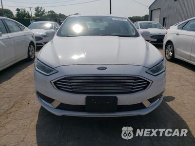 Piąte zdjęcie samochodu w środku: 2018 FORD FUSION SE HYBRID VIN:3FA6P0LU9JR129852 - miniatura