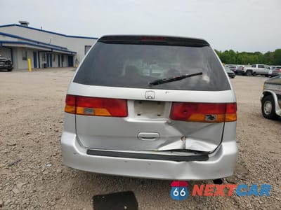 Zdjęcie 6 z 13 samochodu: 2002 HONDA ODYSSEY LX VIN:2HKRL18502H546808 - miniatura